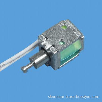 Small electromagnet for coin-operated vending machine